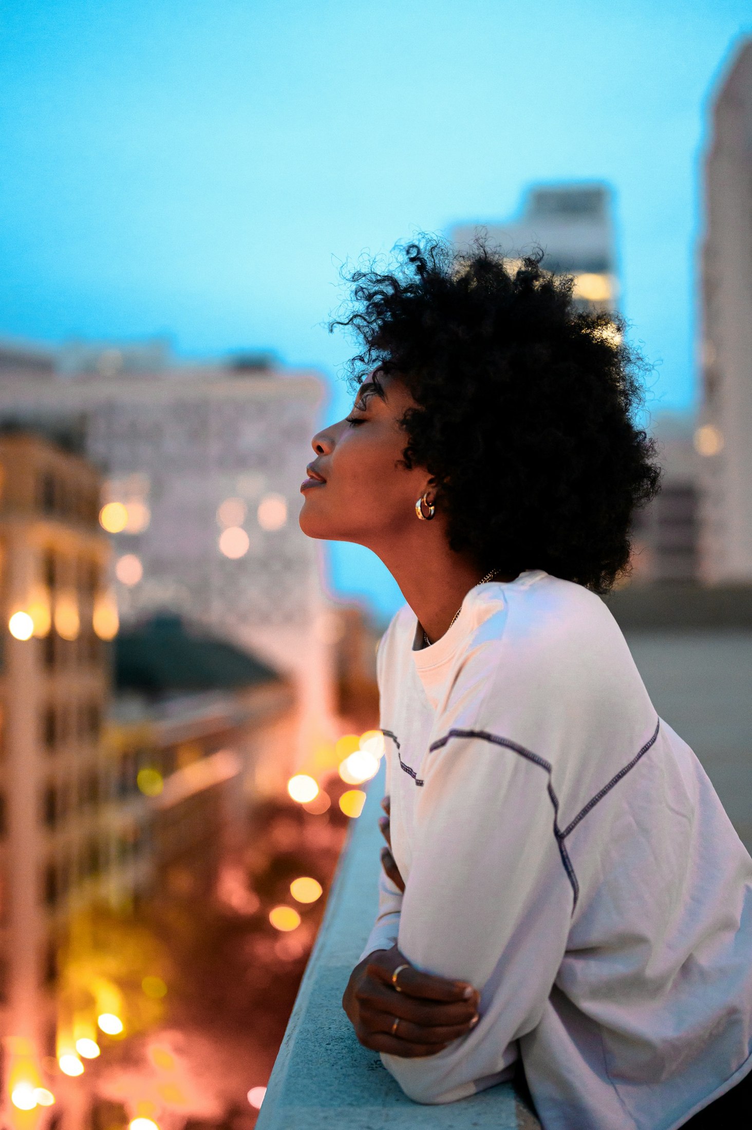 A woman enjoying a quiet moment outdoors